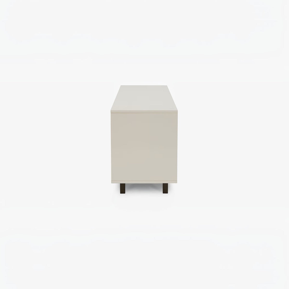 Homecrest Abbott solid wood media stand in a light neutral finish, viewed from the side with dark wooden legs.