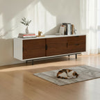 Homecrest Abbott solid wood media stand with white frame and dark wood sliding doors in a bright living room.