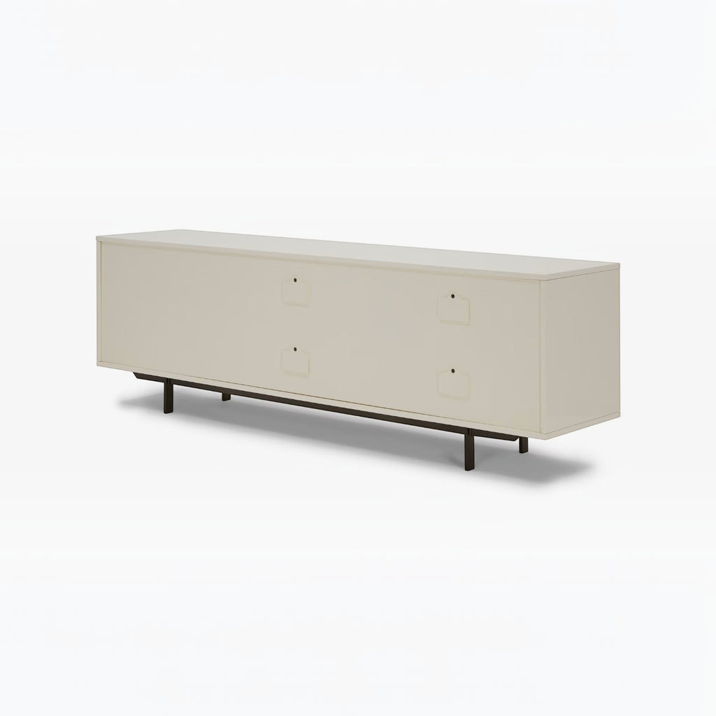 Homecrest Abbott solid wood media stand in a light cream finish with a low-profile design and dark metal legs.
