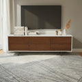 Homecrest Abbott solid wood media stand with a white frame and dark wood cabinet doors and drawers in a living room.