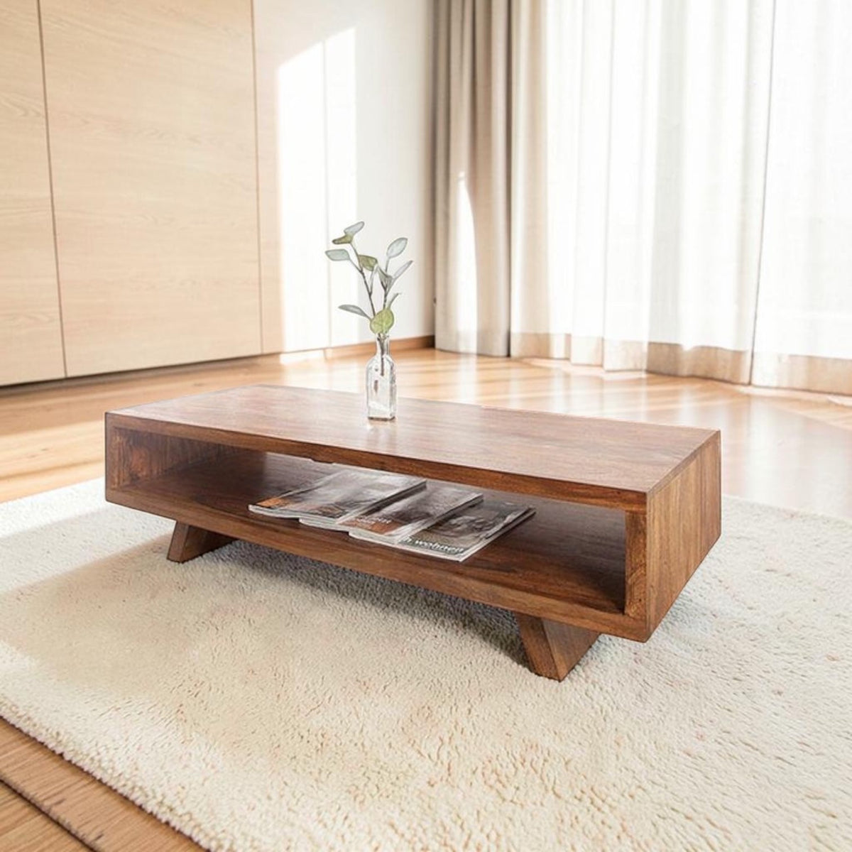 Homecrest Adler low profile rectangular coffee table in solid sheesham wood with an open storage cubby and tapered base