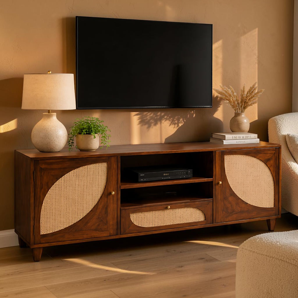 Homecrest Aldon media unit in honey wood with half-moon cane webbing doors, open shelving, and a cane-fronted drawer.