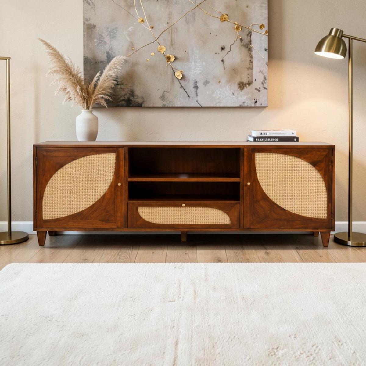 Homecrest Aldon media unit in honey wood with arched cane webbing doors, open shelving, and a cane-fronted drawer.
