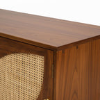 Homecrest Aldon media unit in honey wood finish featuring a half-moon cane webbing cutout on the cabinet door.