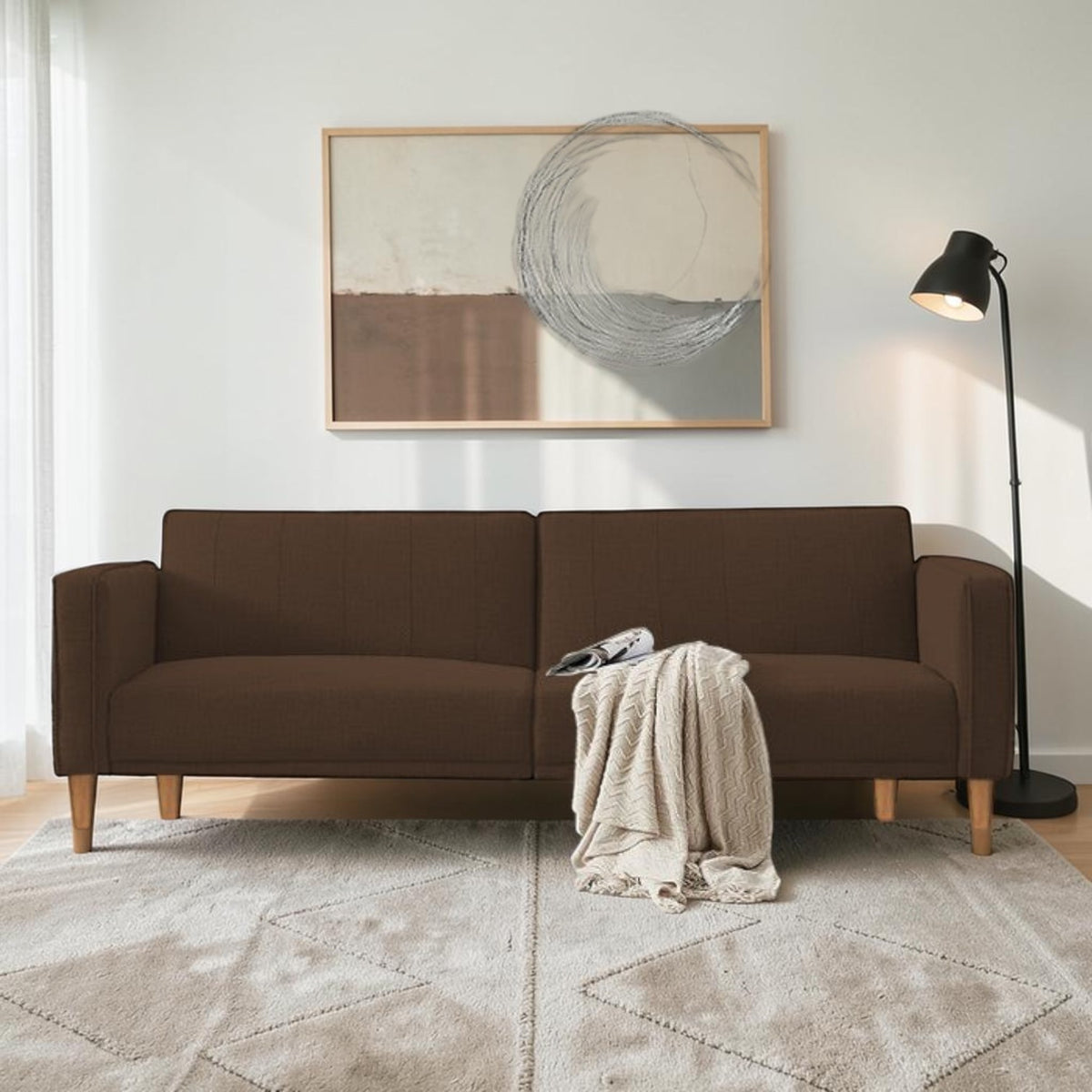 Homecrest Aldous brown polyester three-seater sofa bed with solid wood frame in a modern living room setting