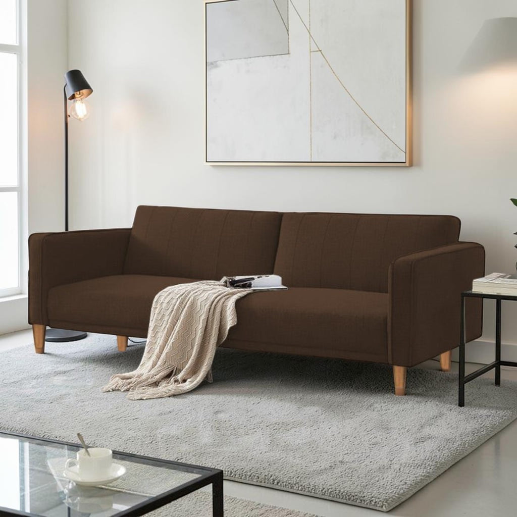 Homecrest Aldous three-seater sofa bed in brown polyester fabric with solid wood legs in a modern living room
