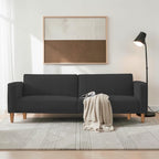 Homecrest Aldous three-seater sofa bed in dark grey polyester fabric with solid wood legs in a modern living room
