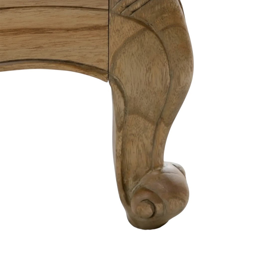 Homecrest Ancaster bed featuring a hand-carved natural mango wood leg with elegant curved detailing.
