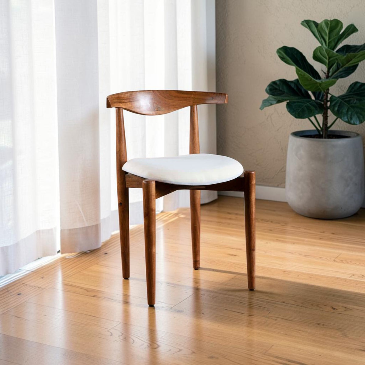 Homecrest Amberley mid-century dining chair made of natural seasoned teak wood with a white upholstered seat.