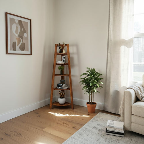 Homecrest Ashcombe corner bookshelf in solid sheesham wood with open ledges and two base drawers in a living room.