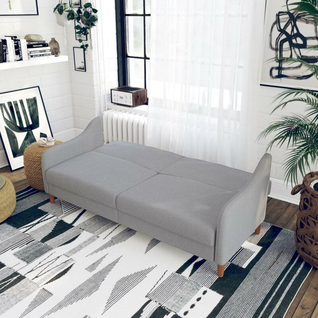 Homecrest Ashcroft light grey polyester sofa bed with rounded arms folded flat in a modern living room setting