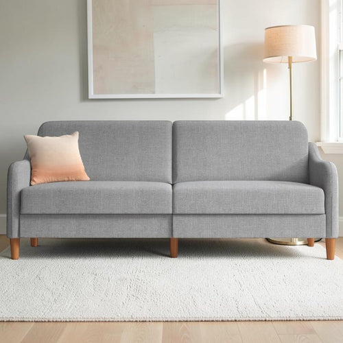 Homecrest Ashcroft light grey polyester three-seat sofa with rounded arms and wooden legs in a modern living room