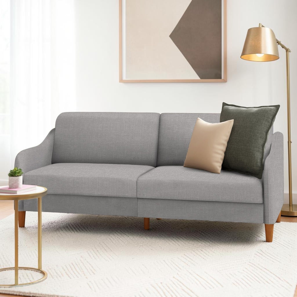 Homecrest Ashcroft light grey three-seat sofa with rounded arms and polyester upholstery in a modern living room
