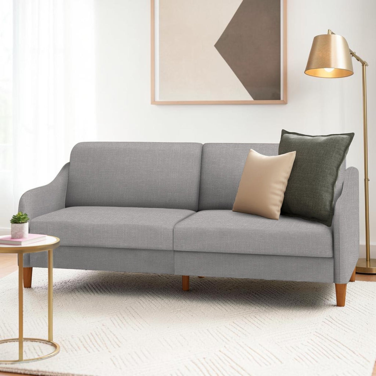 Homecrest Ashcroft light grey three-seat sofa with rounded arms and polyester upholstery in a modern living room