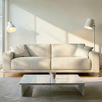 Homecrest Avebury three-seater sofa in off-white poly linen fabric with two matching throw pillows in a bright room.