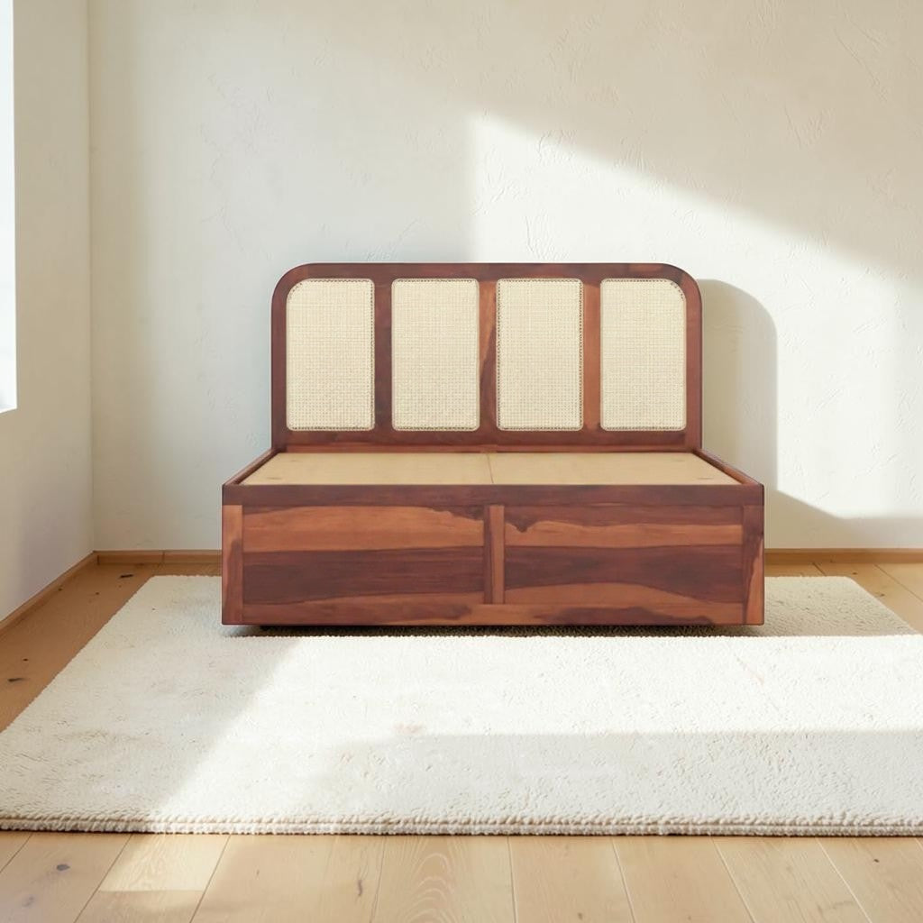 Homecrest Loreto storage bed in dark sheesham wood with a natural cane headboard panel in a bright minimalist room.