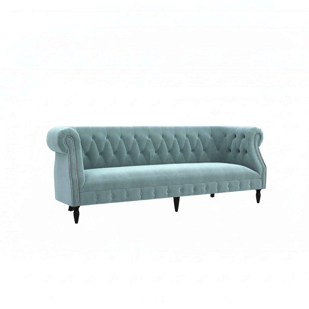 Homecrest Baslow three-seater Chesterfield sofa in dusk blue velvet with tufted back and silver nailhead trim.