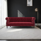 Homecrest Baslow Chesterfield sofa in pomegranate red velvet with tufted backrest and silver nailhead trim
