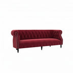 Homecrest Baslow three-seater Chesterfield sofa in pomegranate red velvet with tufted back and nailhead trim