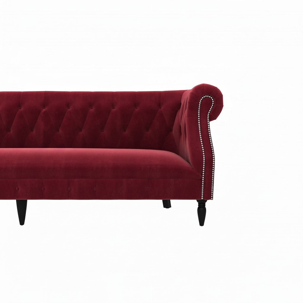 Homecrest Baslow Chesterfield sofa in pomegranate red velvet with button tufting and silver nailhead trim