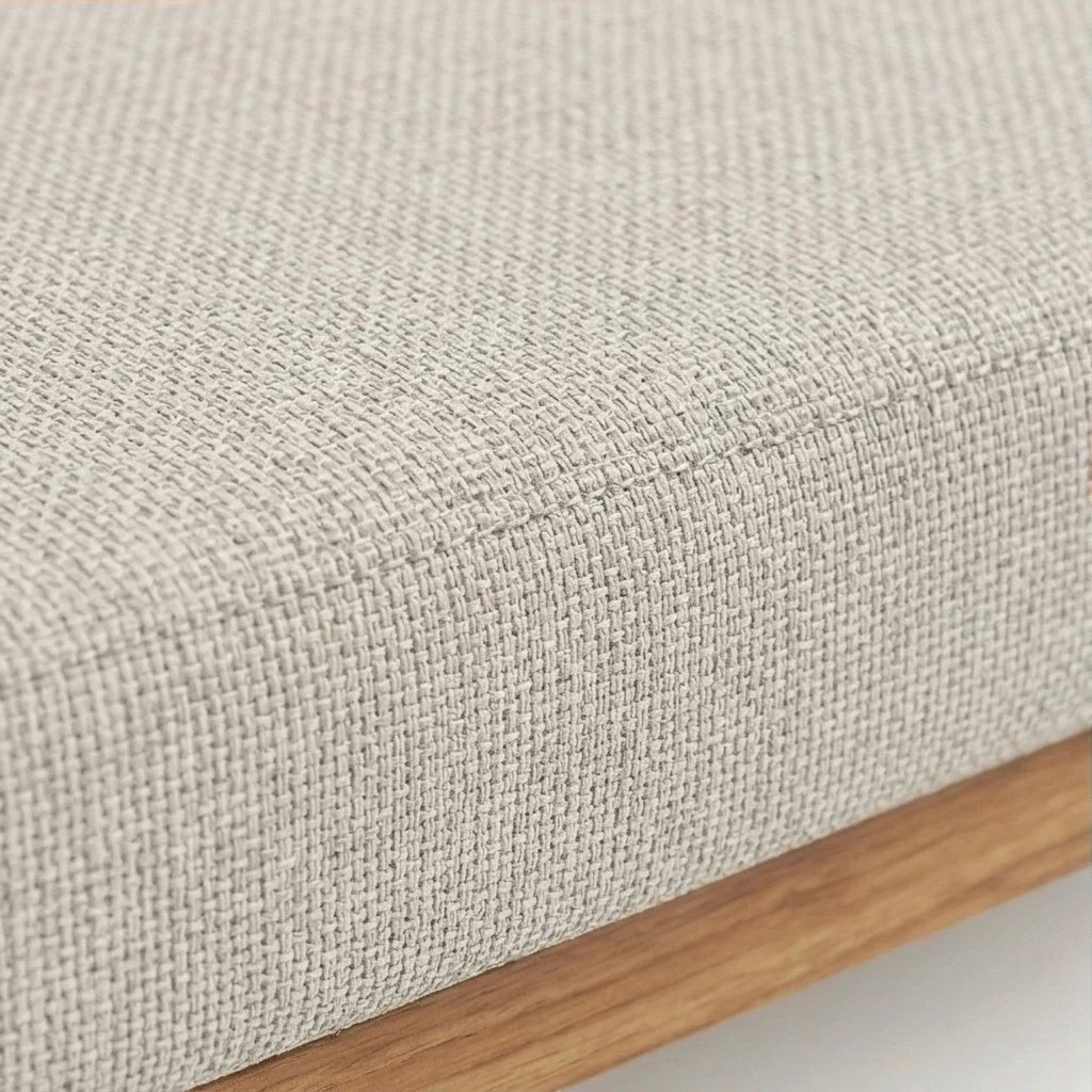 Homecrest 2-seater sofa cushion detail in textured light beige fabric with a natural solid wood frame base