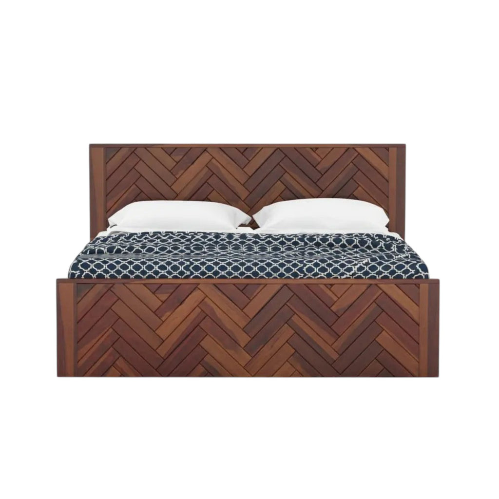 Homecrest Herrick bed made of walnut-finished Sheesham wood with a decorative herringbone headboard and storage base.
