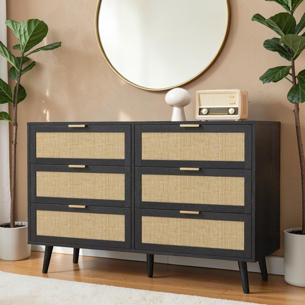 Homecrest Bexley six-drawer chest in black acacia wood with natural woven rattan cane drawer fronts and gold handles.