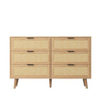 Homecrest Bexley six-drawer chest in natural acacia wood with woven rattan cane drawer fronts and black handles.