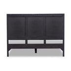 Homecrest black mango wood bed frame with a solid panel headboard design viewed from the back