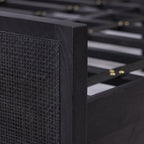 Homecrest black mango wood bed frame featuring a detailed close-up of the woven rattan headboard texture