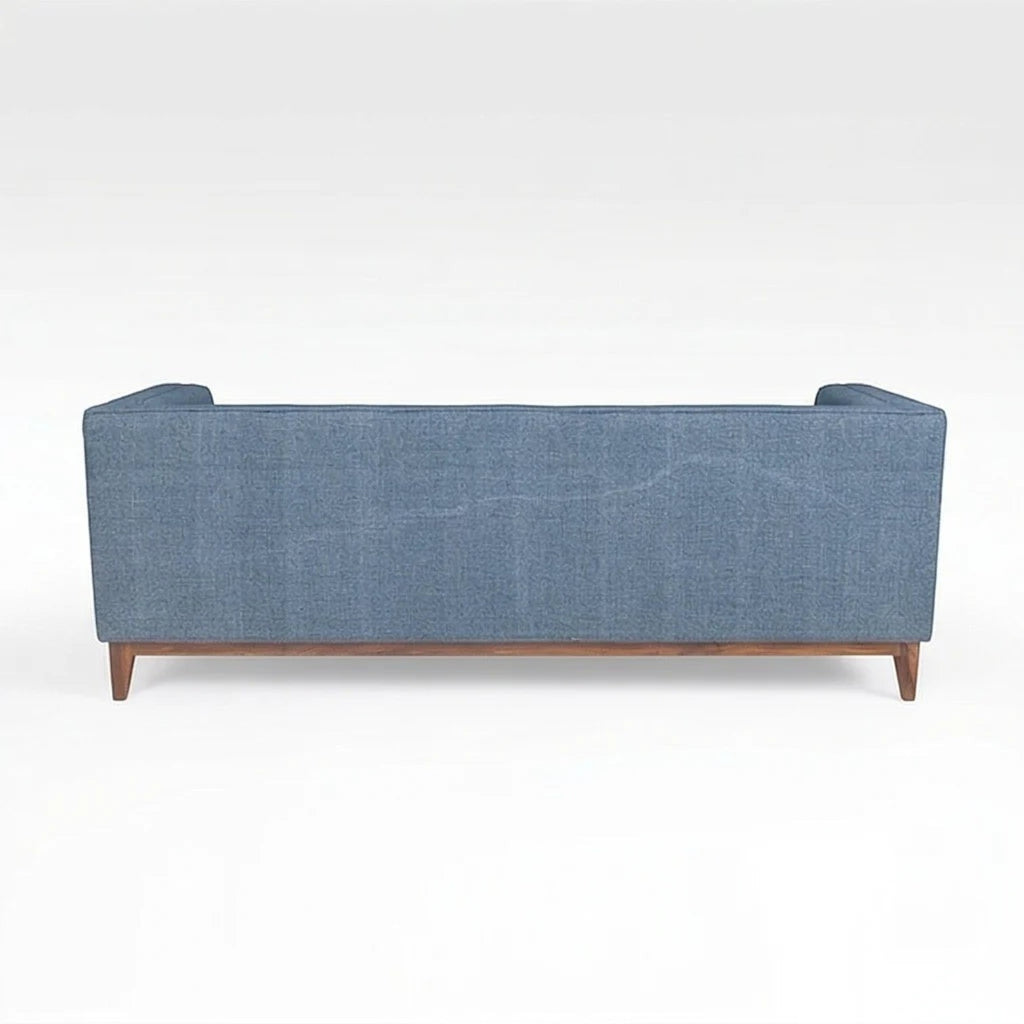 Homecrest 3-seater sofa in blue fabric with a solid wood frame and natural finish, viewed from the back.