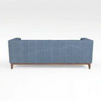 Homecrest 3-seater sofa in blue fabric with a solid wood frame and natural finish, viewed from the back.
