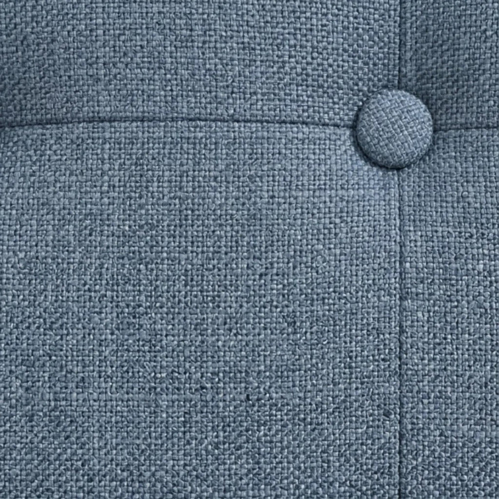Close-up of Homecrest 3-seater sofa featuring blue textured fabric upholstery with a button-tufted backrest detail.