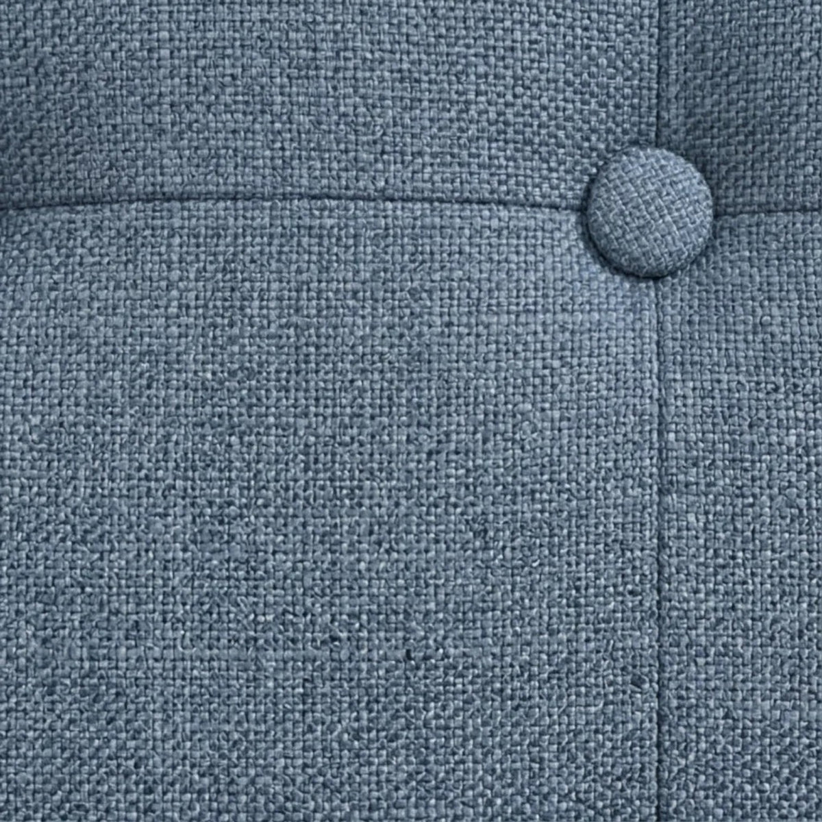 Close-up of Homecrest 3-seater sofa featuring blue textured fabric upholstery with a button-tufted backrest detail.