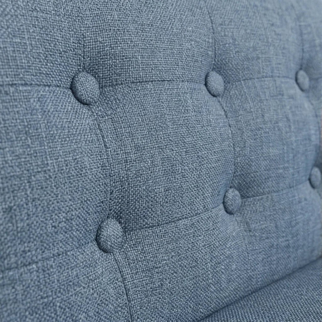 Homecrest blue fabric 3-seater sofa with a detailed tufted backrest and premium textured upholstery