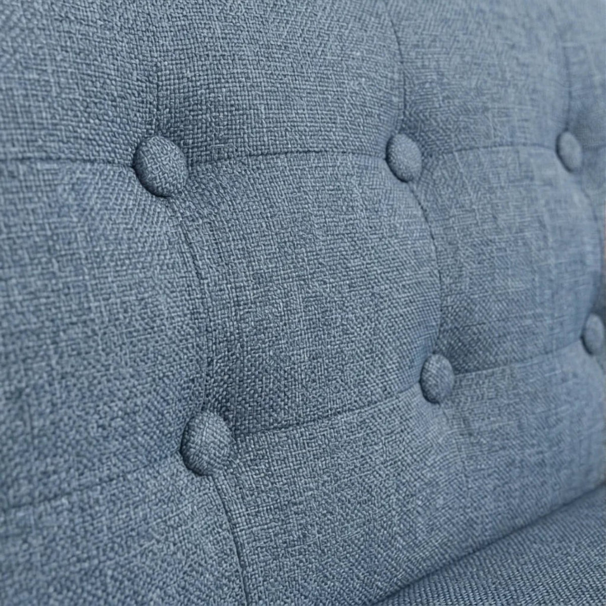 Homecrest blue fabric 3-seater sofa with a detailed tufted backrest and premium textured upholstery