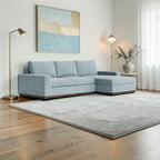 Homecrest Lomond sectional sofa in powder blue with solid wood base, wide armrests, and modular L-shaped design.