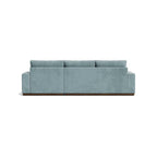 Homecrest Lomond sectional sofa in powder blue with solid wood base, viewed from the back.