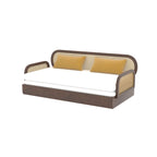 Homecrest Brayton sofa cum bed with dark acacia wood frame, cane-panel back, white cushion, and mustard yellow pillows.