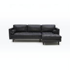 Homecrest Camber sectional sofa in black leather with button-tufted seating and a solid wood frame