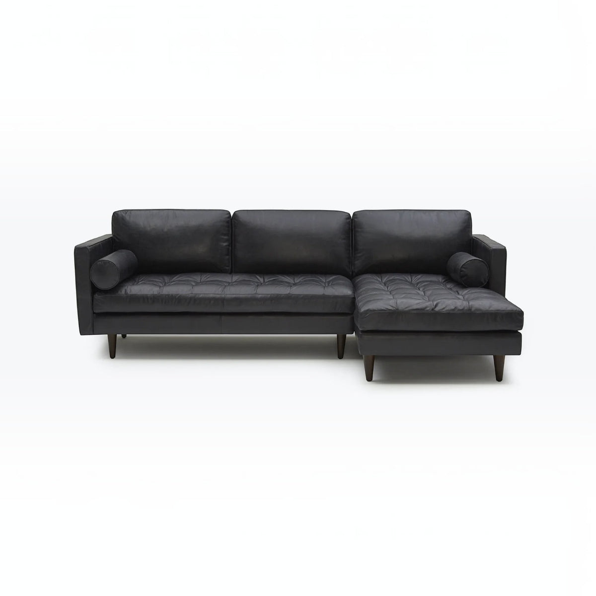 Homecrest Camber sectional sofa in black leather with button-tufted seating and a solid wood frame