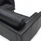 Homecrest Camber sectional sofa in Rhino Black leather with a deep boxy silhouette and button-tufted seating