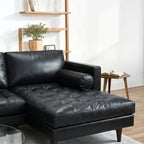 Homecrest Camber sectional sofa in black leather with button-tufted seating and a deep boxy silhouette
