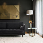 Homecrest Bicknor 2 seater sofa in black suede velvet fabric with tufted seat cushions in a modern living room setting.