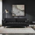 Homecrest Bicknor 2 seater sofa in black suede velvet fabric with a solid wood frame in a modern living room setting.