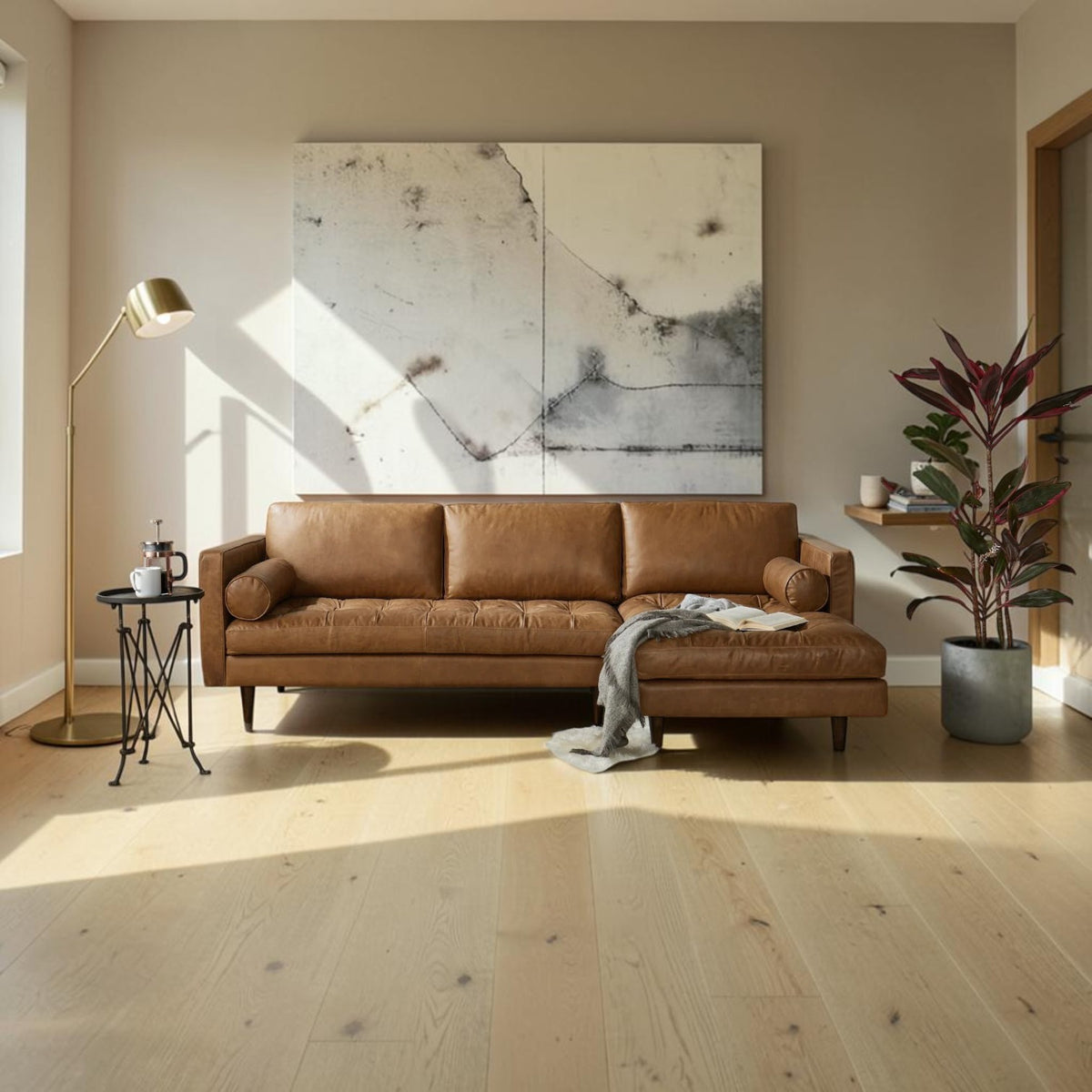 Homecrest Camber sectional sofa in camel brown leather with button-tufted seating in a modern living room setting