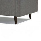 Homecrest Bicknor 2 seater sofa in gray suede velvet fabric featuring dark tapered wooden legs on a white background