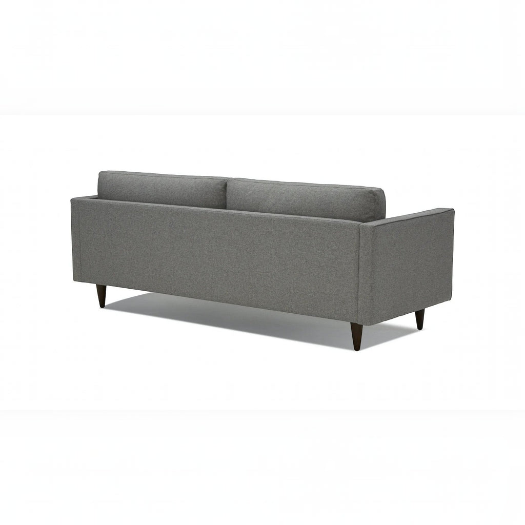 Homecrest Bicknor 2 seater sofa in gray suede velvet fabric with tapered legs, back view on a white background.