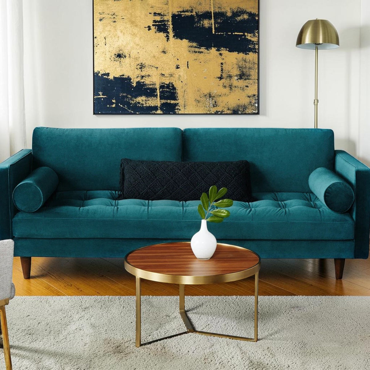 Homecrest Bicknor 2 seater sofa in peacock suede velvet with tufted seat and tapered legs in a modern living room