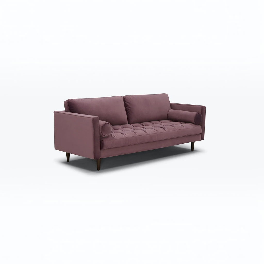Homecrest Bicknor 2 seater sofa in purple suede velvet fabric with tufted seat and tapered wooden legs.